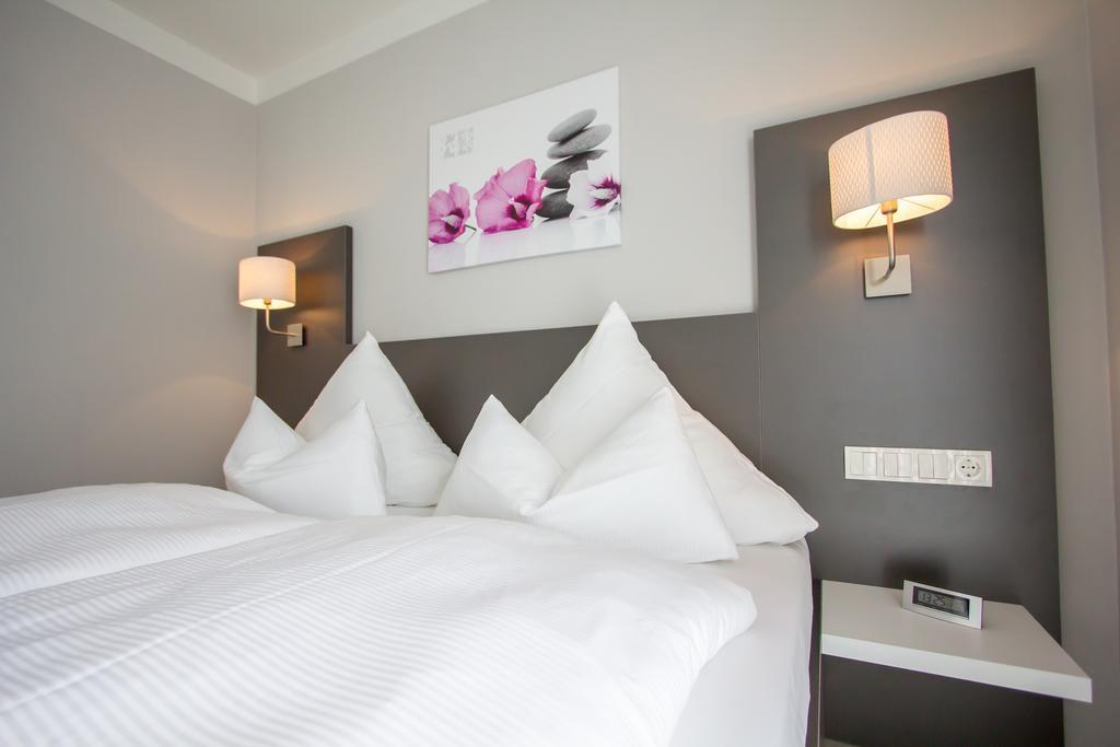 Aparthotel "Am Fliess" Hoyerswerda Quarto foto