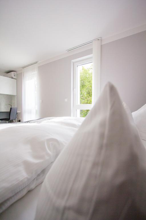 Aparthotel "Am Fliess" Hoyerswerda Quarto foto