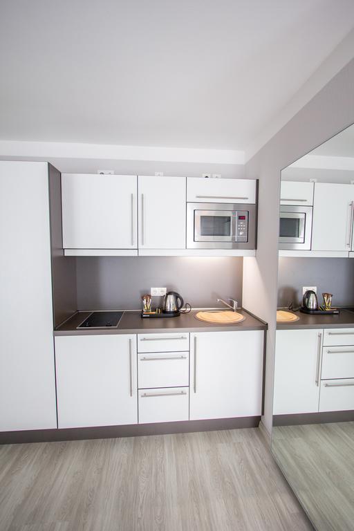 Aparthotel "Am Fliess" Hoyerswerda Quarto foto