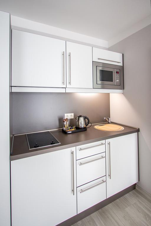 Aparthotel "Am Fliess" Hoyerswerda Quarto foto